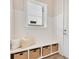 Bright laundry room features built-in bench and storage at 400 W Hazel St, Orlando, FL 32804