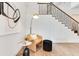 Light-filled sitting area featuring a comfortable chair, side table, and modern floor lamp at 400 W Hazel St, Orlando, FL 32804