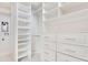 Large walk-in closet with ample shelving and drawers at 400 W Hazel St, Orlando, FL 32804