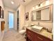 Bathroom with modern vanity and a walk-in shower at 41289 County Road, 452, Leesburg, FL 34788