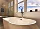 Modern bathroom with a stylish freestanding bathtub at 41289 County Road, 452, Leesburg, FL 34788