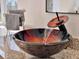 Unique glass vessel sink in an updated bathroom at 41289 County Road, 452, Leesburg, FL 34788