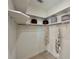 Spacious closet with shelving and hanging rod at 41289 County Road, 452, Leesburg, FL 34788