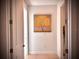 Bright entryway with large gold tree art and tile flooring at 41289 County Road, 452, Leesburg, FL 34788