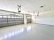 Spacious two-car garage featuring epoxy flooring at 41289 County Road, 452, Leesburg, FL 34788