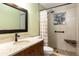 Updated bathroom with a walk-in shower and modern vanity at 425 Iowa Woods E Cir, Orlando, FL 32824