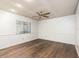 Spacious bedroom with wood floors and ceiling fan at 425 Iowa Woods E Cir, Orlando, FL 32824