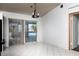 Dining room with sliding glass doors leading to the pool at 425 Iowa Woods E Cir, Orlando, FL 32824