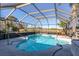 Inviting screened pool with a large patio at 425 Iowa Woods E Cir, Orlando, FL 32824