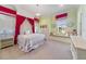 Cheerful bedroom with built-in window seat and bright decor at 4326 Isabella Cir, Windermere, FL 34786