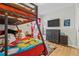 Mickey Mouse themed bedroom with bunk beds and a dresser at 4705 Pershoie Ln, Kissimmee, FL 34746