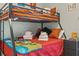 Mickey Mouse themed bedroom with bunk beds and ample storage at 4705 Pershoie Ln, Kissimmee, FL 34746