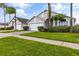 Attractive home exterior with curb appeal and landscaping at 4705 Pershoie Ln, Kissimmee, FL 34746