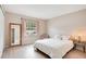 Bedroom with full-size bed and mirrored closet at 4944 Tangerine Ave # 4944, Winter Park, FL 32792