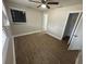 Bedroom with wood-look laminate flooring at 5822 Forest Grove Blvd, Orlando, FL 32808