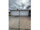 Two-car garage with attached carport at 5822 Forest Grove Blvd, Orlando, FL 32808