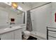 Clean bathroom with shower/tub combo, toilet, and vanity at 5978 Braemar Pl # 108, Orlando, FL 32822