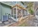 Screened-in porch offers outdoor space for relaxing at 5978 Braemar Pl # 108, Orlando, FL 32822