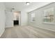 Bedroom with carpet, two windows, and en-suite bathroom at 611 Marsh Reed Dr, Winter Garden, FL 34787