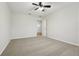 Spacious bedroom with carpet and access to another room at 611 Marsh Reed Dr, Winter Garden, FL 34787