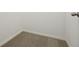 Spacious walk-in closet with carpeted floor at 611 Marsh Reed Dr, Winter Garden, FL 34787