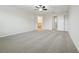 Spacious main bedroom with carpeted floor and ceiling fan at 611 Marsh Reed Dr, Winter Garden, FL 34787