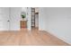 Bright bedroom with hardwood floors, a walk-in closet, and an ensuite bathroom at 6564 Lagoon St, Windermere, FL 34786