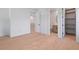 Bedroom with hardwood floors, access to walk-in closet and ensuite bathroom at 6564 Lagoon St, Windermere, FL 34786