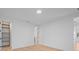 Empty bedroom with hardwood floors and bright lighting fixtures at 6564 Lagoon St, Windermere, FL 34786