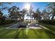 Relaxing pool and spa area with lake view at 6564 Lagoon St, Windermere, FL 34786