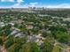Aerial view of residential area near lake and city skyline, showcasing neighborhood at 809 Maxwell St, Orlando, FL 32804