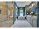 Serene bathroom showcases a soaking tub, glass-enclosed shower, and dual vanities for a spa-like experience at 809 Maxwell St, Orlando, FL 32804