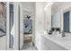 Bright bathroom features double vanity, stylish fixtures, and tiled shower, seamlessly blending modern design with comfort at 809 Maxwell St, Orlando, FL 32804