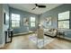 Comfortable bedroom with ample natural light, hardwood floors, and neutral decor, creating a relaxing atmosphere at 809 Maxwell St, Orlando, FL 32804