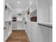 Custom walk-in closet with ample shelving, drawers, and hanging space for organized storage at 809 Maxwell St, Orlando, FL 32804