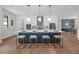 Modern open-concept kitchen with a large island, stainless steel appliances, and barstool seating at 809 Maxwell St, Orlando, FL 32804