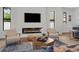 Cozy living room with a modern fireplace, and comfortable seating at 809 Maxwell St, Orlando, FL 32804