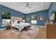 Spacious main bedroom with large windows, plush bedding, and stylish decor for a comfortable retreat at 809 Maxwell St, Orlando, FL 32804