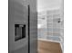 Spacious pantry with stainless steel refrigerator and abundant white shelving, perfect for organized storage at 809 Maxwell St, Orlando, FL 32804