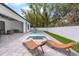 Backyard with a pool, spa, outdoor furniture, and privacy fence creating a relaxing outdoor oasis at 809 Maxwell St, Orlando, FL 32804