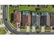 Aerial view of houses with pools and lush green lawns at 8118 Yellow Crane Dr, Kissimmee, FL 34747