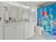 ' bathroom with double vanity and mermaid theme at 8118 Yellow Crane Dr, Kissimmee, FL 34747