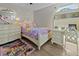 Bedroom with princess-themed decor and built-in desk at 8118 Yellow Crane Dr, Kissimmee, FL 34747