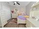 Bedroom with princess-themed decor and built-in desk at 8118 Yellow Crane Dr, Kissimmee, FL 34747