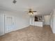 Spacious living room, tile floors, and access to kitchen at 914 Charo Pkwy # 112, Davenport, FL 33897