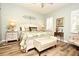 Serene main bedroom with a king-size bed, decorative pillows and soft lighting at 1254 Chessington Cir, Lake Mary, FL 32746