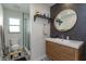 Modern bathroom with a floating vanity and patterned floor tiles at 1354 Tierra Cir, Winter Park, FL 32792