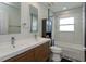 Updated bathroom with a double vanity and a soaking tub at 1354 Tierra Cir, Winter Park, FL 32792