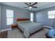Spacious bedroom with mid-century modern furniture and a large bed at 1354 Tierra Cir, Winter Park, FL 32792