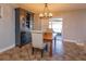 Dining room with a wooden table, chandelier, and hutch at 1354 Tierra Cir, Winter Park, FL 32792